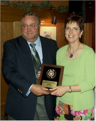 James Steele presenting Janet Jacobs with the Business Person of the Year 2005 Award.